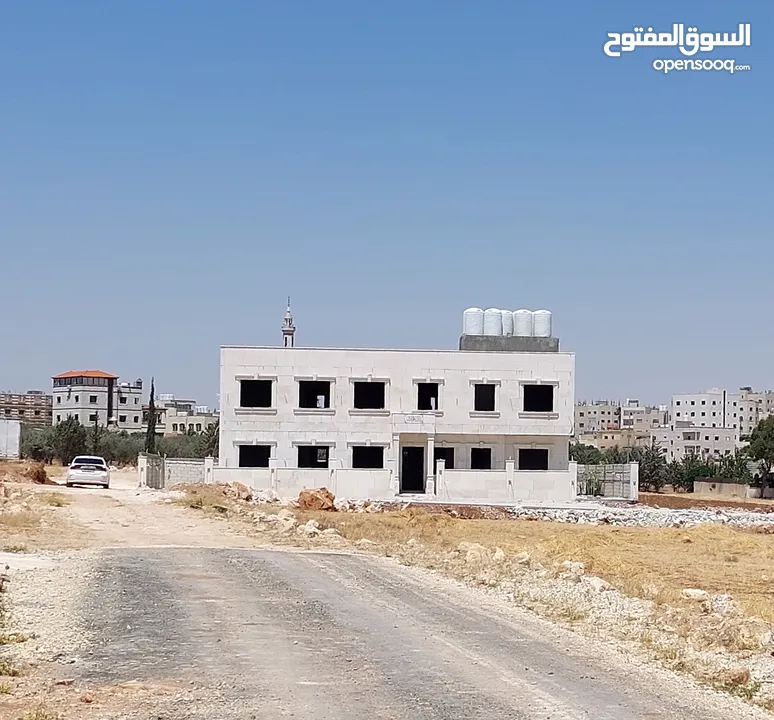 ارض نص دونم  في منطقة جاوا قرب مدارس الضاحية