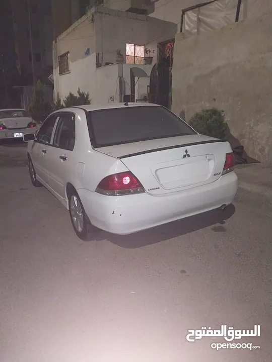 ميتسوبيشي لانسر 2012 الفحص مرفق بالصور