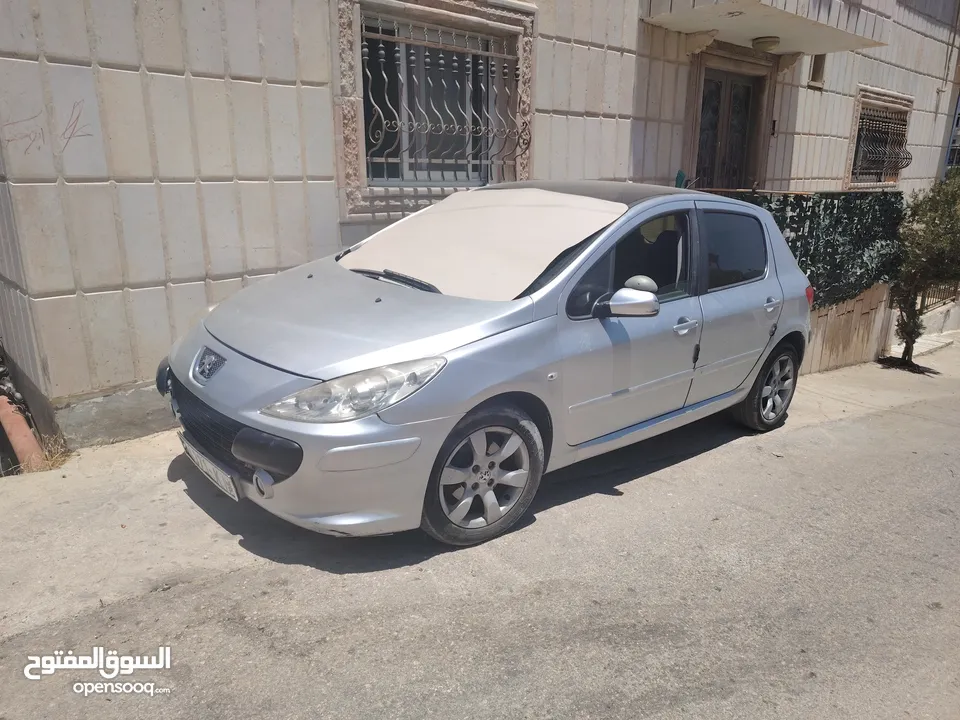 سياره بيجو 307 بحاله جيده جدآ متور 2000 cc بنزين اتوماتيك موديل 2007