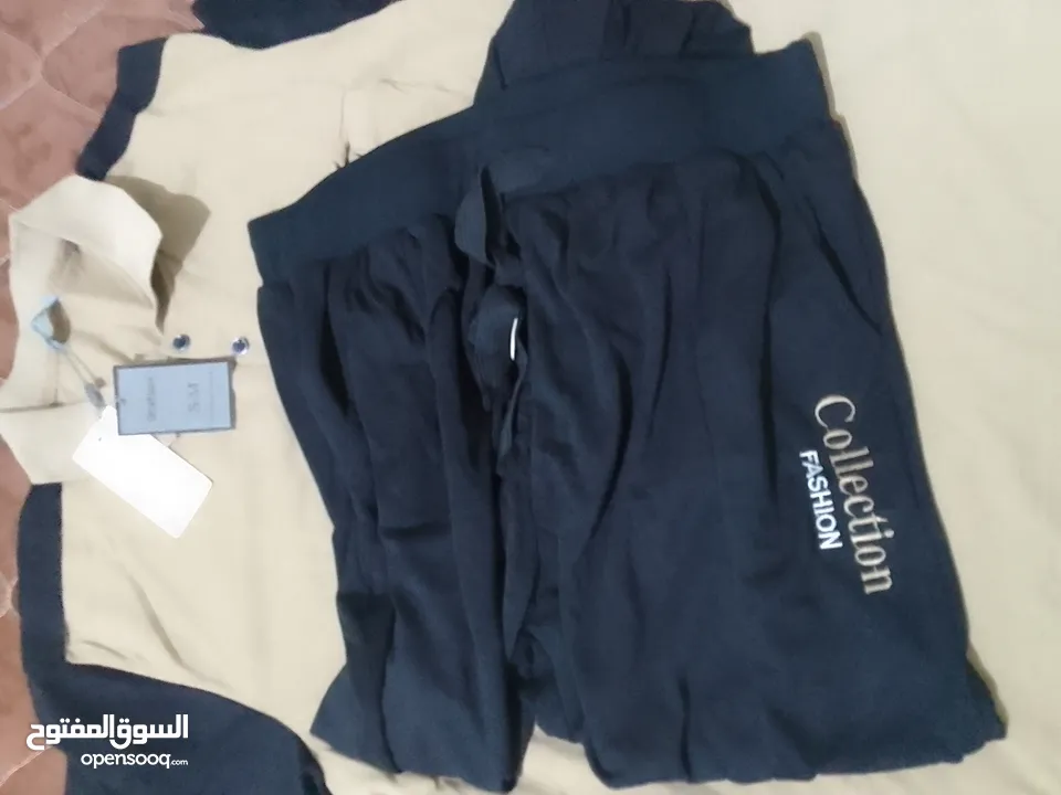 بدلة رياضية رجالية لون اسود وكابتشينو نخب اول صيني الصناعة مقاس(52) 2XL جديدة