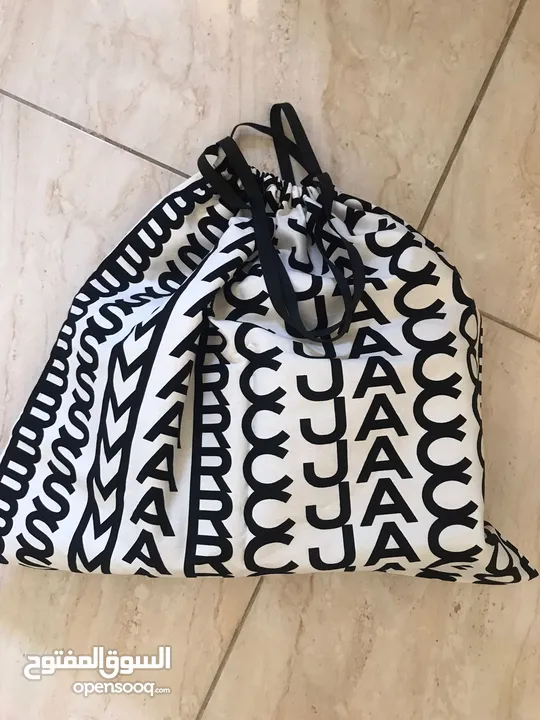 حقيبة توتي من ماركس جايكوبس أصليه جديده.Marc Jacobs Tote bag The Washed Monogram Crossbody