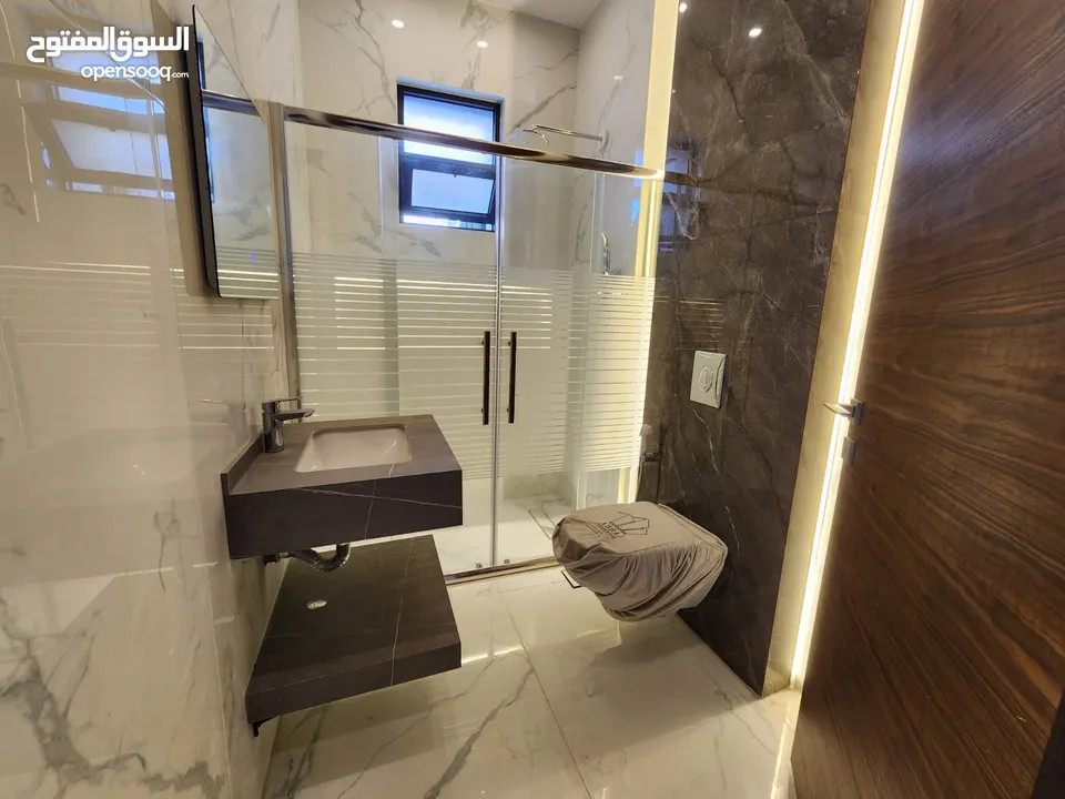شقة طابقية فاخرة للبيع في عبدون ref : 14386