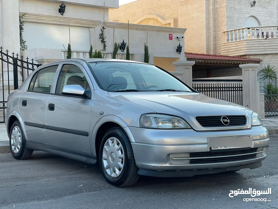 ‎أوبل استرا موديل 2001  وارد الوكالة ومالك واحد فقط من الشركة عداد 100الف كيلو فقط