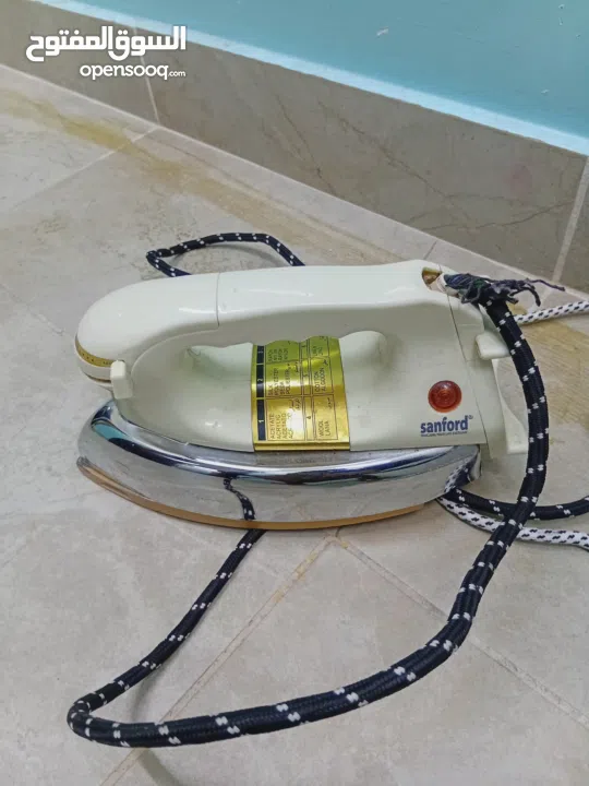 مكواة ملابس 2 جيده معه طابعه