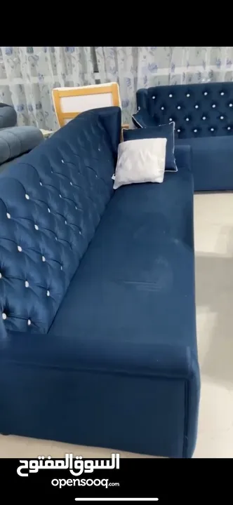 2 fancy dark blue sofas