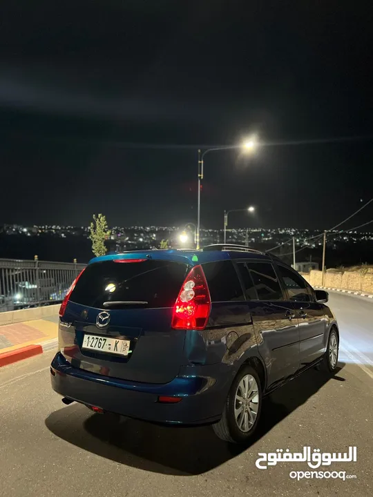 مازدا 5 جير عادي 6+1 متور 2000 بنزين رخصه و تامين جديد  عداد قليل فحص نخبب سعرر كااششش