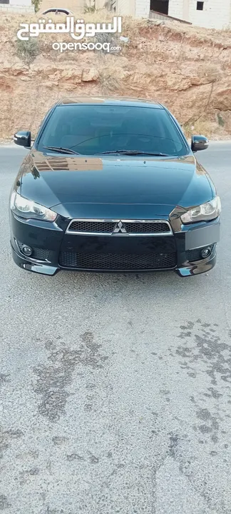متسوبيشي لانسر فراشة موديل 2015 فحص مرفق مع الصور بحالة الوكاااااالة  ماشية 49 الف km  أصلي