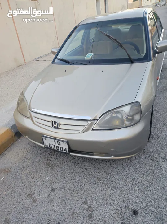 هوندا سيفيك لون ذهبي موديل 2003 جير عادي  إقتصادية جدا تقطع بالتنكة 280 كيلو بور ستيرنح سنتر لوك