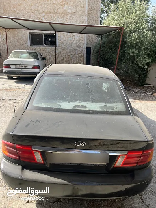 كيا اوبتيما 2002