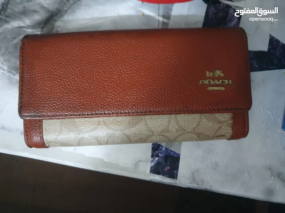 محفظة  COACH NEW YORK