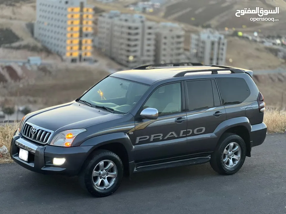 تويوتا برادو جيب موديل 2005  ليمتد من فحص كامل بحالة الشركة فل عدا الفتحة ممشى قليل لون فيراني بحالة