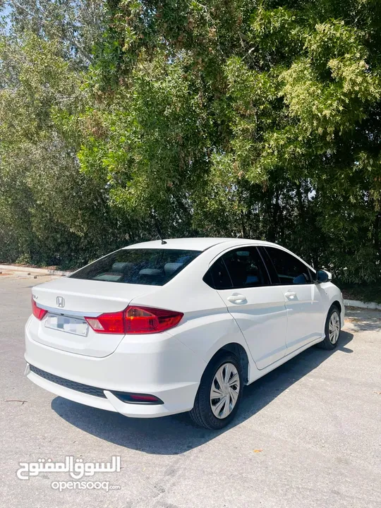 # HONDA CITY ( MODEL - 2019) WHITE COLOR SEDAN CAR 35 66 74 74