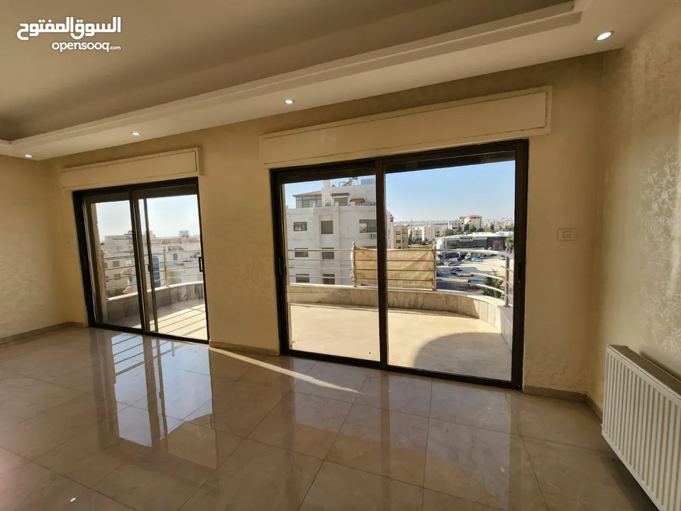 شقة مع روف منفصلين للبيع في دير غبار ref: 14232