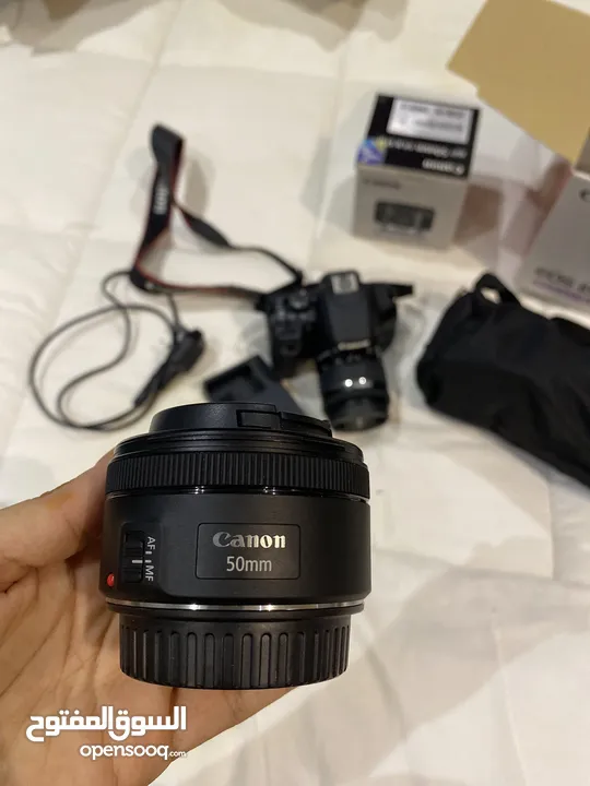 كاميرا كانون 850d وعدسه 50mm وستاند تصوير