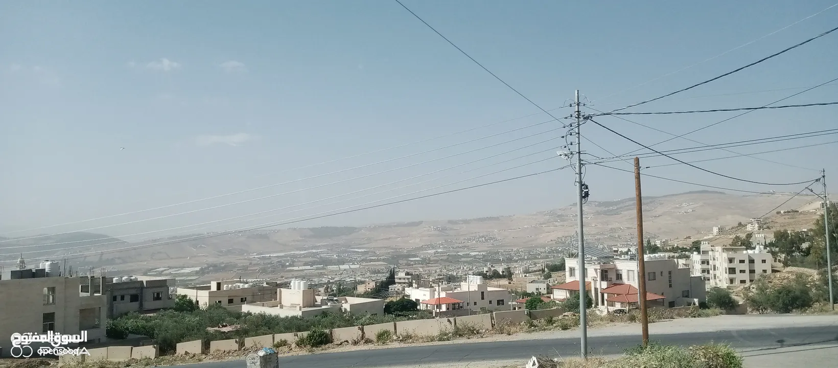 أرض للبيع في أبو نصير على شارعين تصلح لبناء فيلا إطلالة رائعة قريبة على شارع الأردن