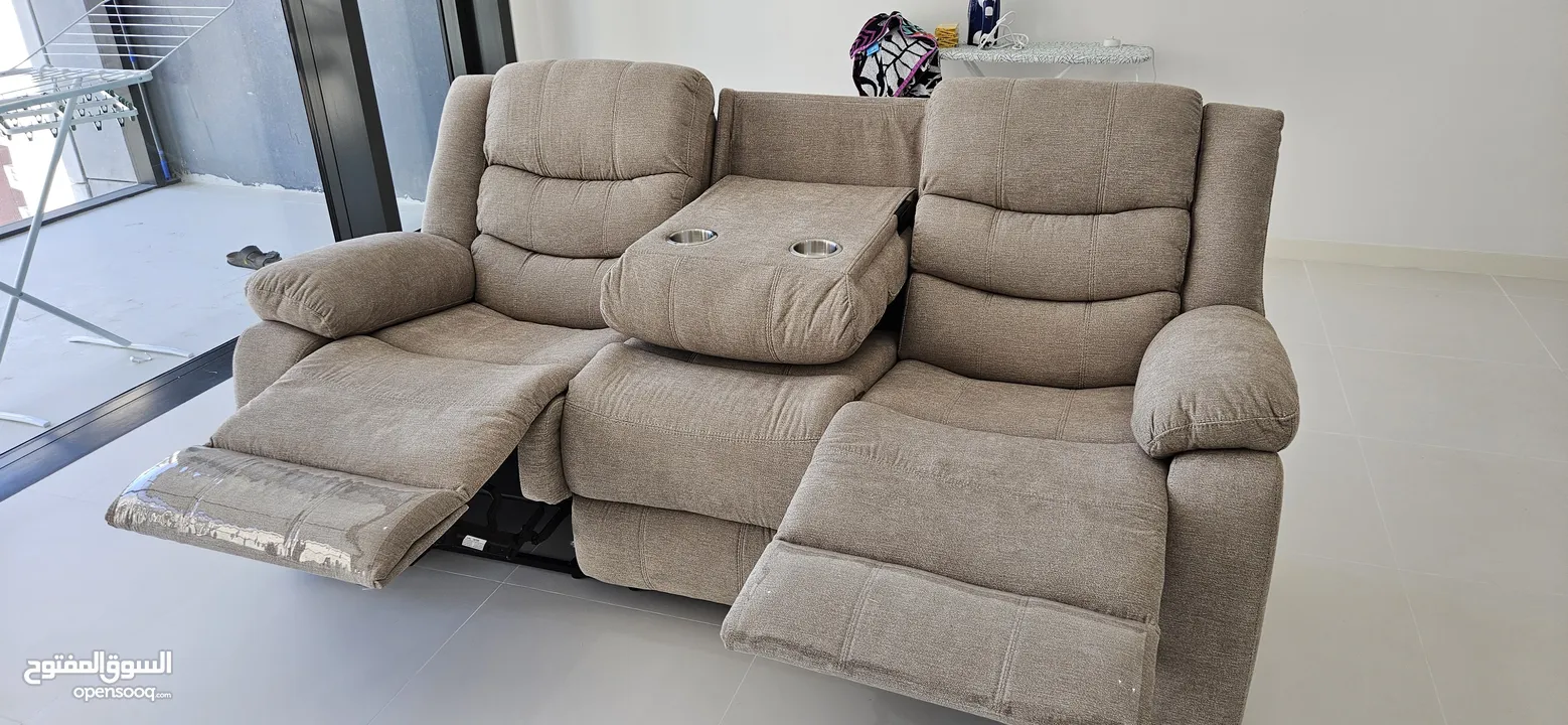 3 piece Sofa with two recliners and centre drinks console