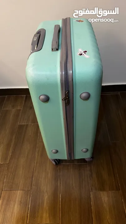 ‏شنطة سفر كبيرة  travel suitcase