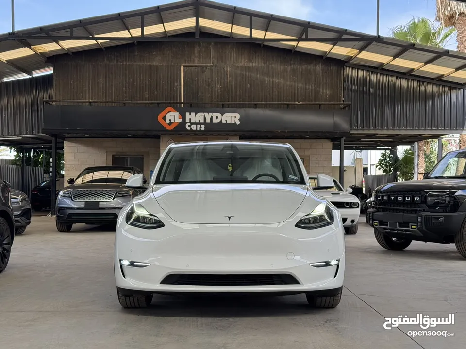 Tesla Model Y 2022 ( LONG RANGE DUAL MOTOR )  فحص الشريف  7 جيد  ، B+ اوتوسكور ايرباج مغلق غير مفتوح