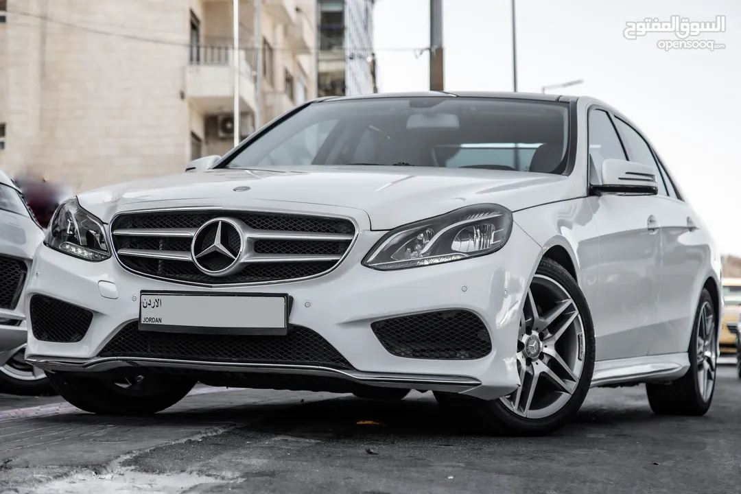 Mercedes E200 2014 Avantgarde Amg kit     السيارة وارد و بحالة الوكالة