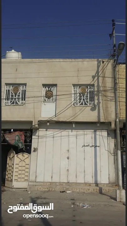 بيت مع بنايه طابقين على شارع تجاري الموفقية الاملاك قرب محلات محمد البغدادي