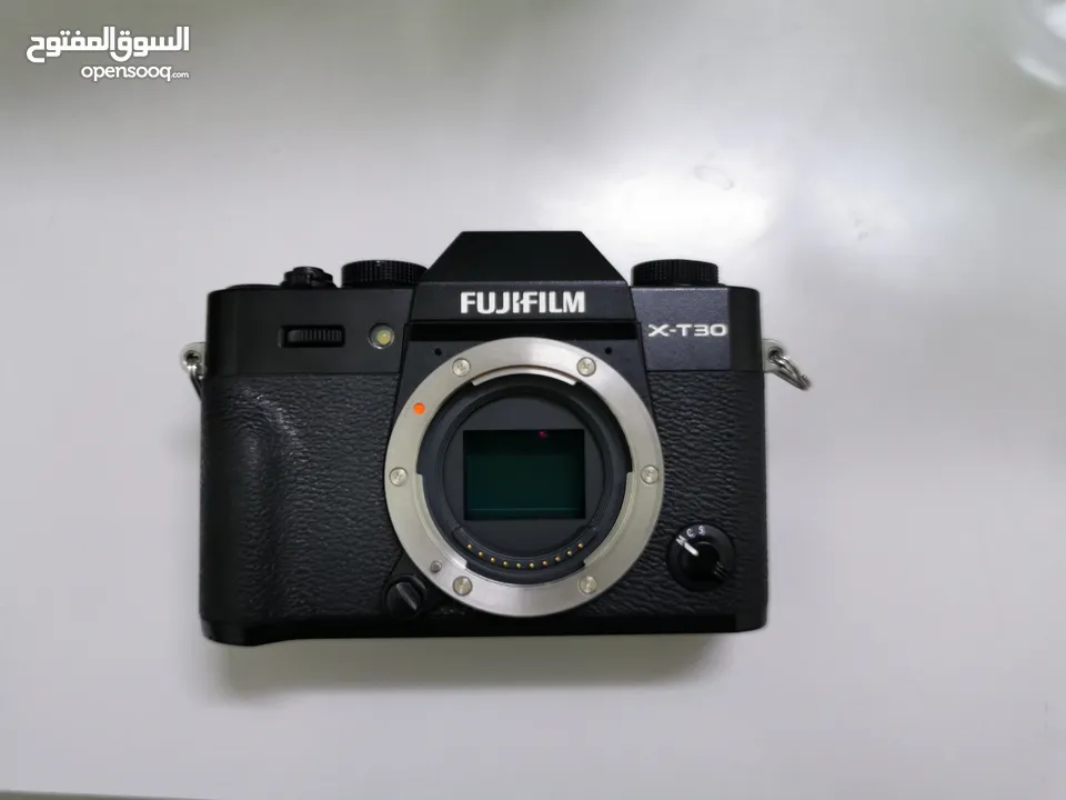 Looks like new fujifilm xt30 camera with 18-55 lence +camera bag