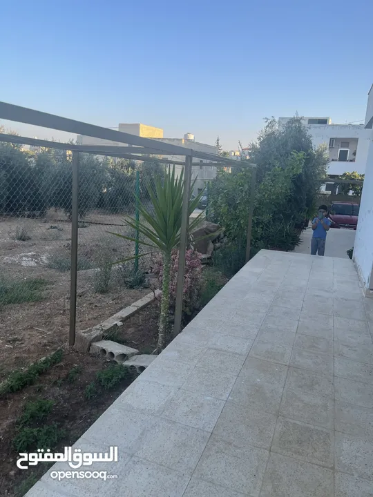 ارض دونم مع بيت ارضي وبيت طابقين