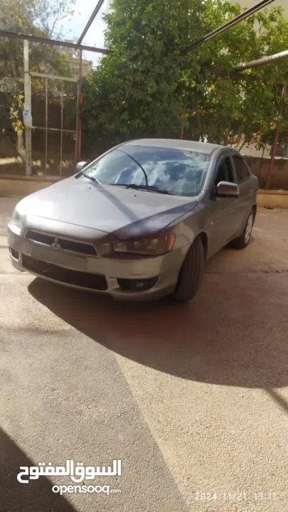 سيارة ممتازة جدا لانسر 2012 عداد 126 الف اصل برايفت ماتور 1600