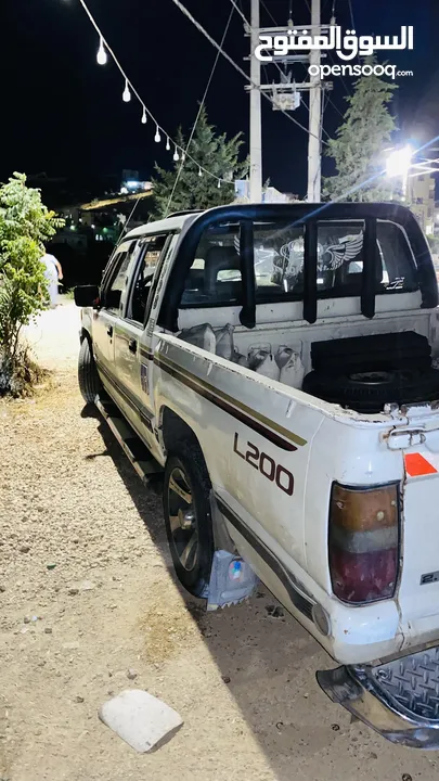 مستبيشي 1998 L200 لون ابيض للبيع اقساط دفعه 1000بحاجت ترخيص منتهي 6اشهر للستفسار