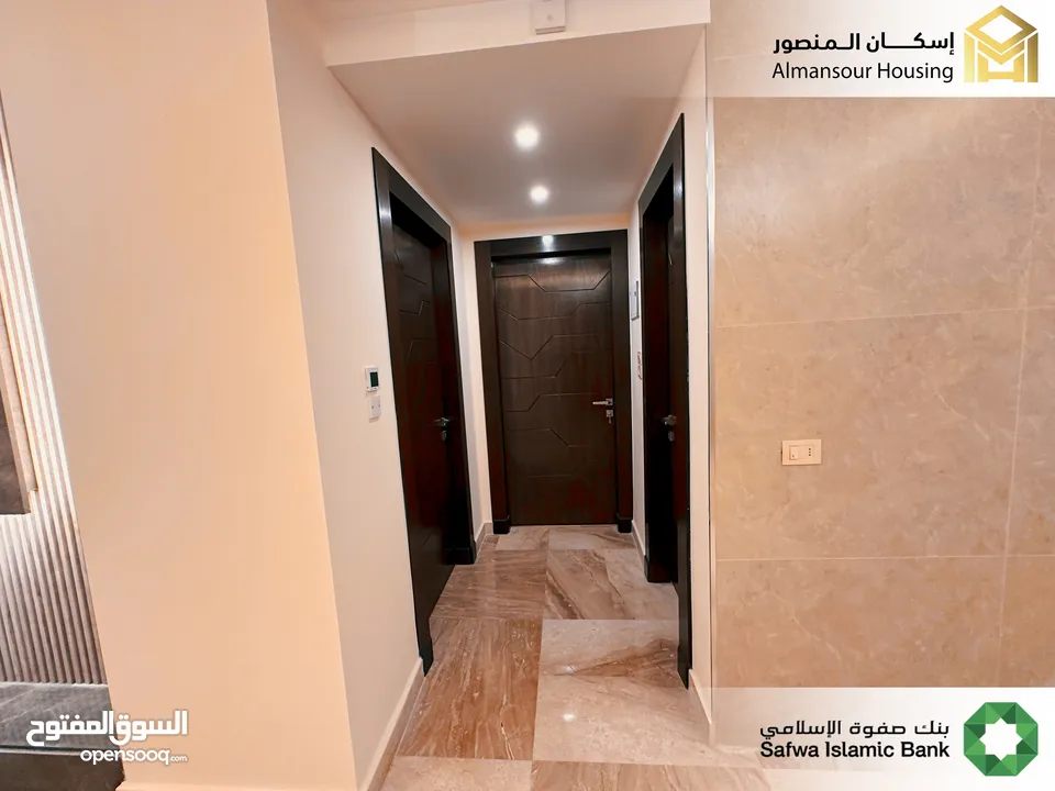 شقة طابق ثاني يمين 85م2 فاخرة للبيع في خلدا/ مشروع مكة مول 5 (2/2) ( إسكان المنصور )