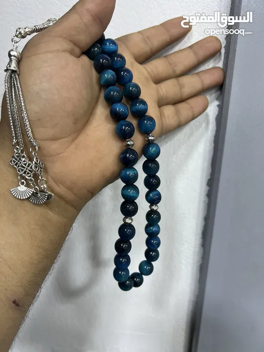 عرض خاص سبحه عين النمر ازرق او ذهبي بسعر حرق 33 حبة حلوة مش صغيرة للعلم مع طقم انتيومون مرتب