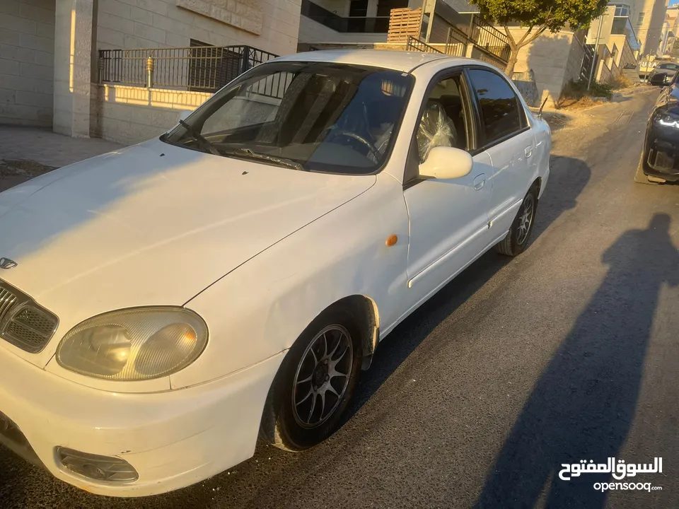 دايو لانوس موديل 2002 جير عادي سيارة مشالله ولا ضربة افحص وين بدك ترخيص تامين دفع فقط كاش