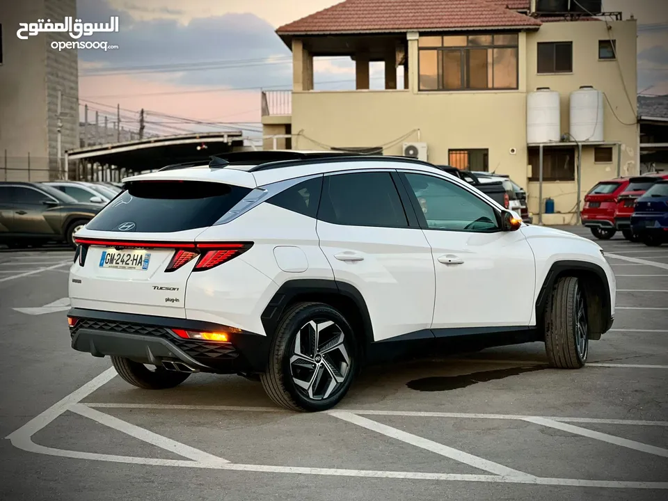 هونداي توسان/2022 Plug In فل الفل فتحة سقف بانوراما  4x4 ///271Hp   ( Haybrid) 1600cc