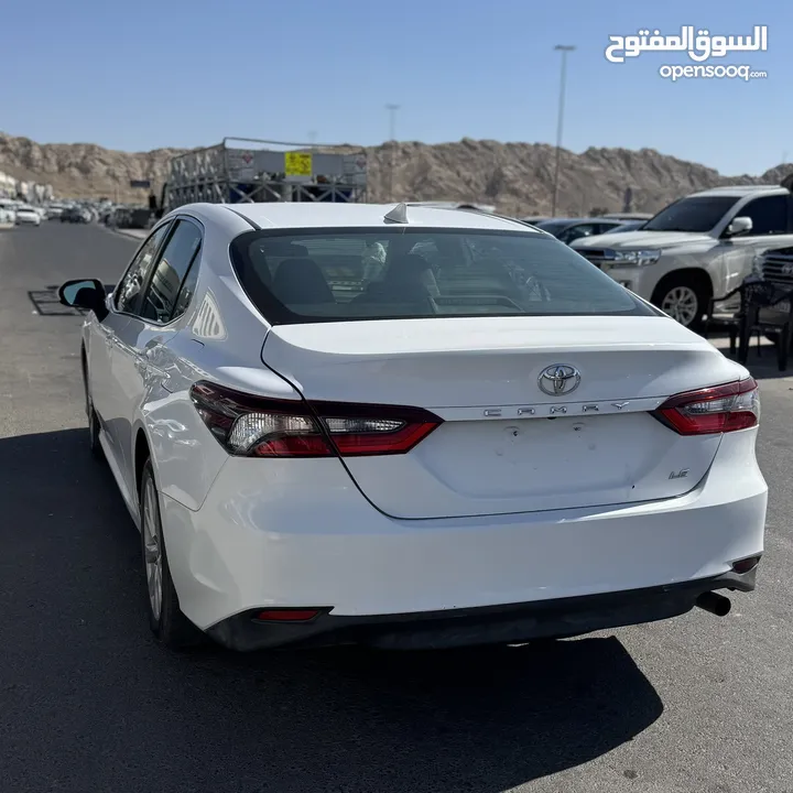 تويوتا كامري  TOYOTA CAMRY LE 2021  ابيض ايرباقات الوكالة دعمة خفيفة وارد امريكا