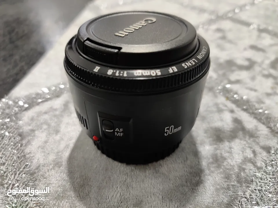 Canon EF 50mm f/1.8 II بحال الجديد بالكرتونه