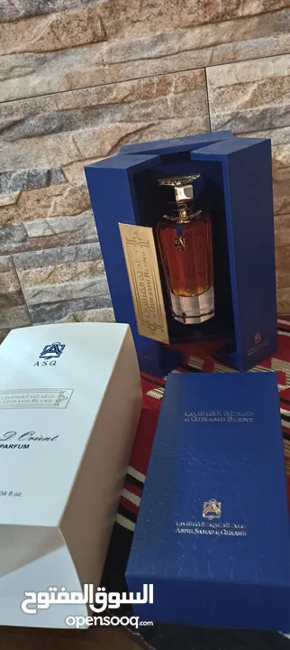 عطر خلطه القرشي جديد90مل للرجال والنساء  مع ستاند خشب لون ازرق