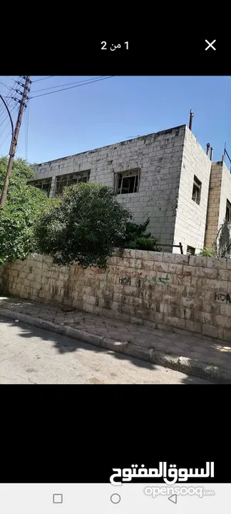 عماره بجبل عمان للبيع طابقين 4 شقق