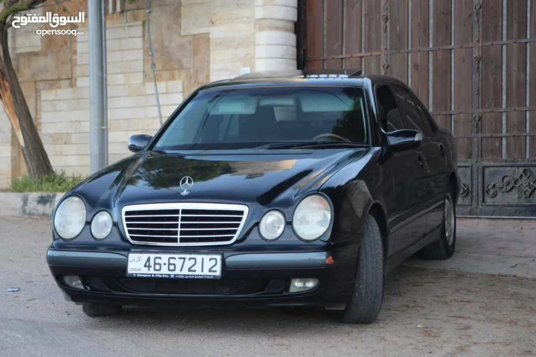 E200. 2002  قرش ونص 2002  رقم الهاتف بالوصف