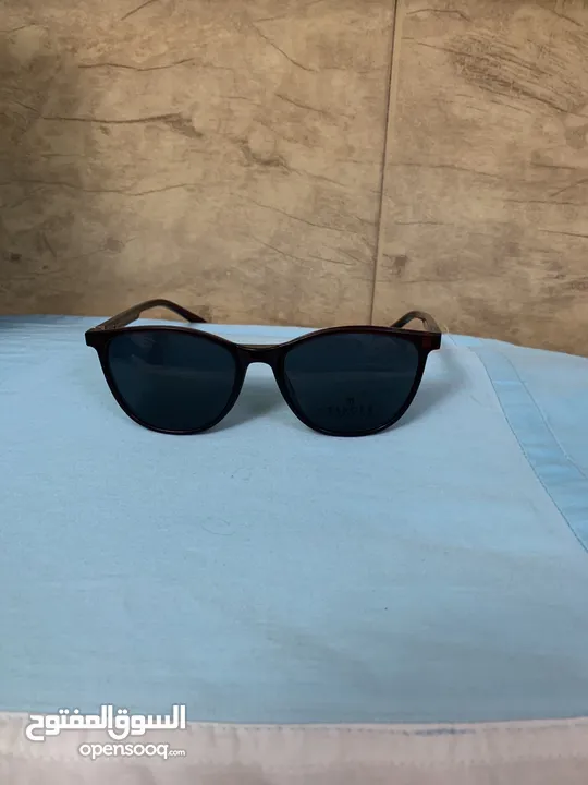 ‏نظارة شمسية تتحول إلى نظارة طبية قابل لتفاوض