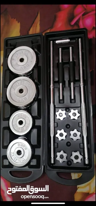 50 kg dumbbells new only silver cast iron with the bar and box