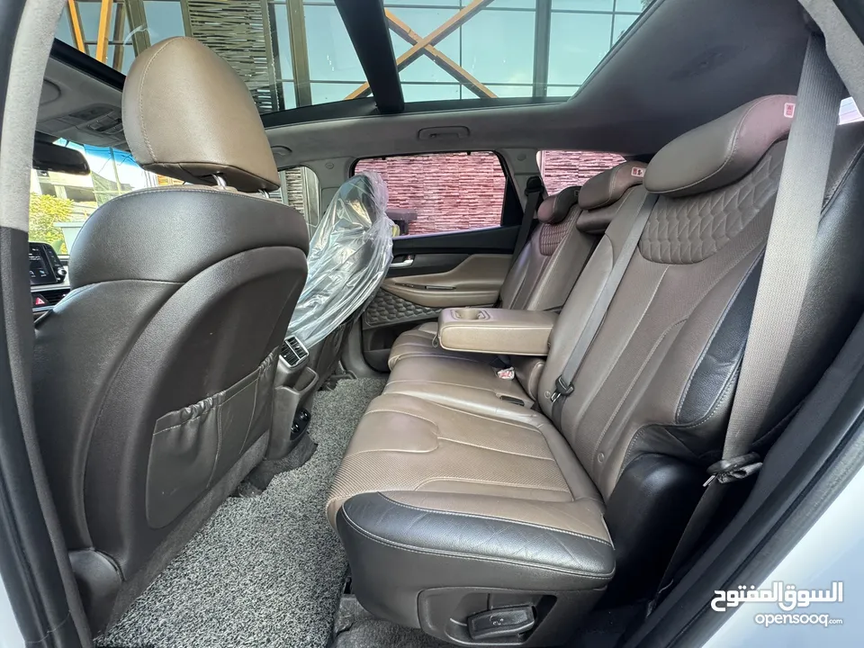 فرصة نادرة Hyundai Santa Fe بانوراما غرفة بني    (6+1 مقاعد أصلية) ممشى قليل و بحالة الوكالة