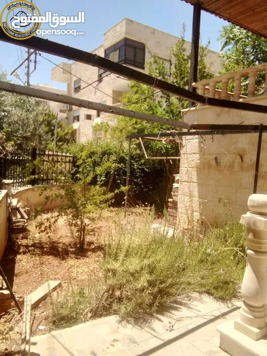 شقة أرضية مميزة للبيع في الرابية  - قرب كامبردج 190م مع حديقة وترسات بسعر مغري