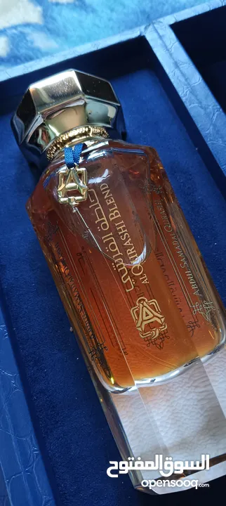 عطر خلطه القرشي جديد90مل للرجال والنساء  مع ستاند خشب لون ازرق