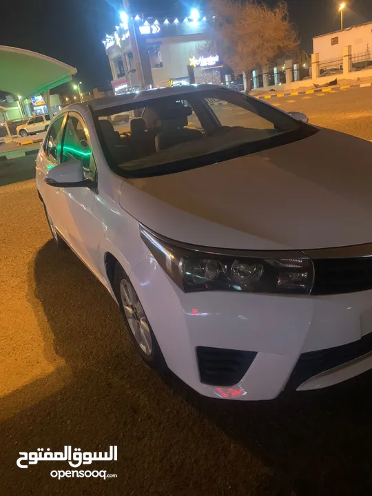 كورلا 2015 ابيض 1600 CC  شرط الفحص 1600 د.ك