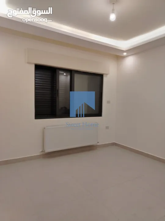 شقة أرضية فاخرة للبيع في خلدا - قرب إشارة الدر المنثور 140م مع حديقة وترسات 70م لم تسكن