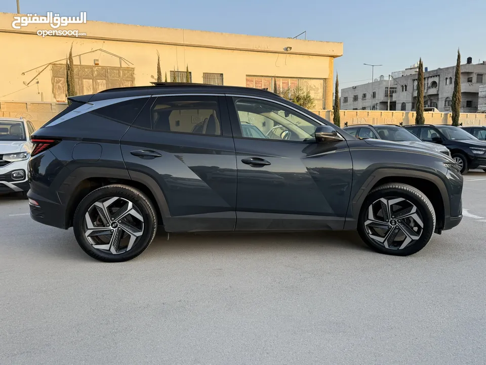 هونداي توسان ترخيص 2022 محرك 1600 هايبرد plug in/يقطع على الشحنه 65 كيلو متر  271 حصان