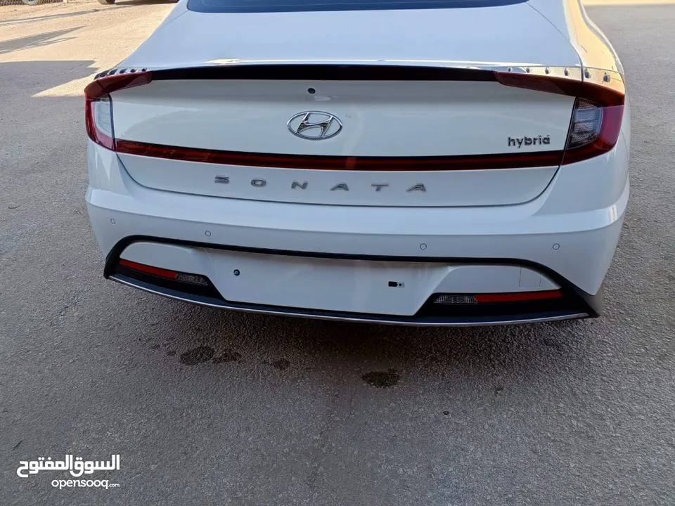 SONATA HYBRID 2020 ابيض لؤلؤي كوري  عداد 32 الف كيلو