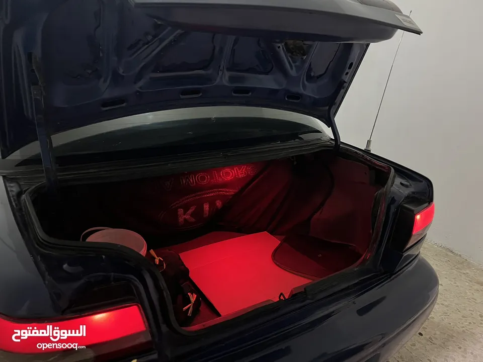 كيا سيفيا لون ازرق ميتالك نظيفه مع جنط 15 مميز كاوشوك وكاله غرفه نطيفه بطاريه جديده لسى كفالتها معها
