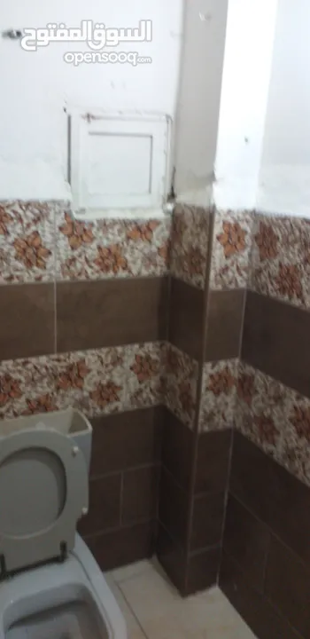 عمارة للبيع 3طوابق دوبلكس ومحلين حي الحسين السوق التجاري