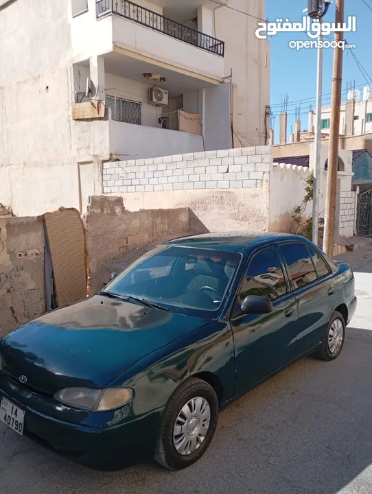 هونداي اكسنت توماتيك اصلي موديل 95 مكيف ثلاجه ترخيص شهر 3/2026 سياره زي ما بالصور واحلى