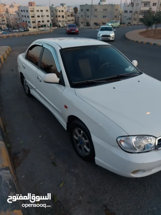 كيا سبكيترا للبيع موديل 2002 جير عادي نظيفة وشغل مقناة